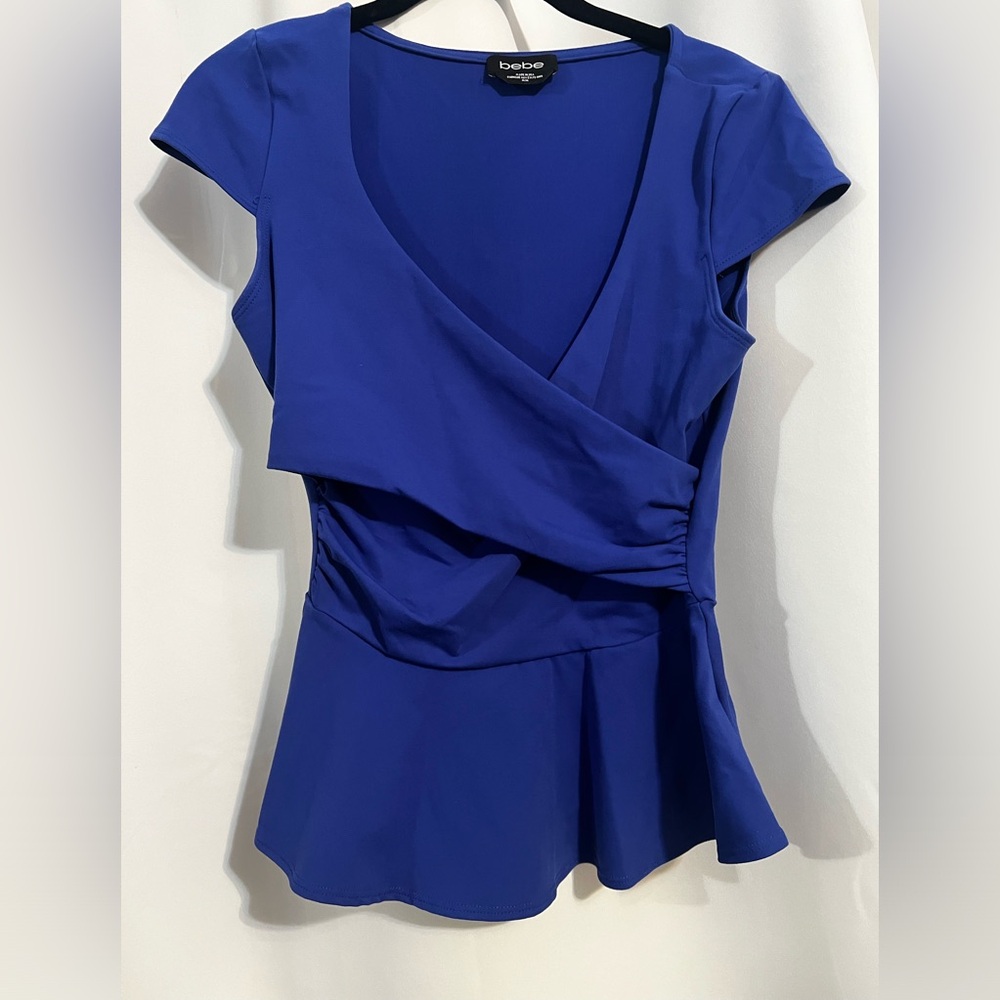 Bebe peplum top